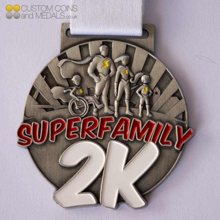 Superfamily 2K Round Medal